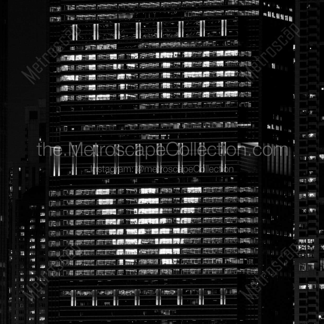 fly the w in anthem building at night Black & White Wall Art