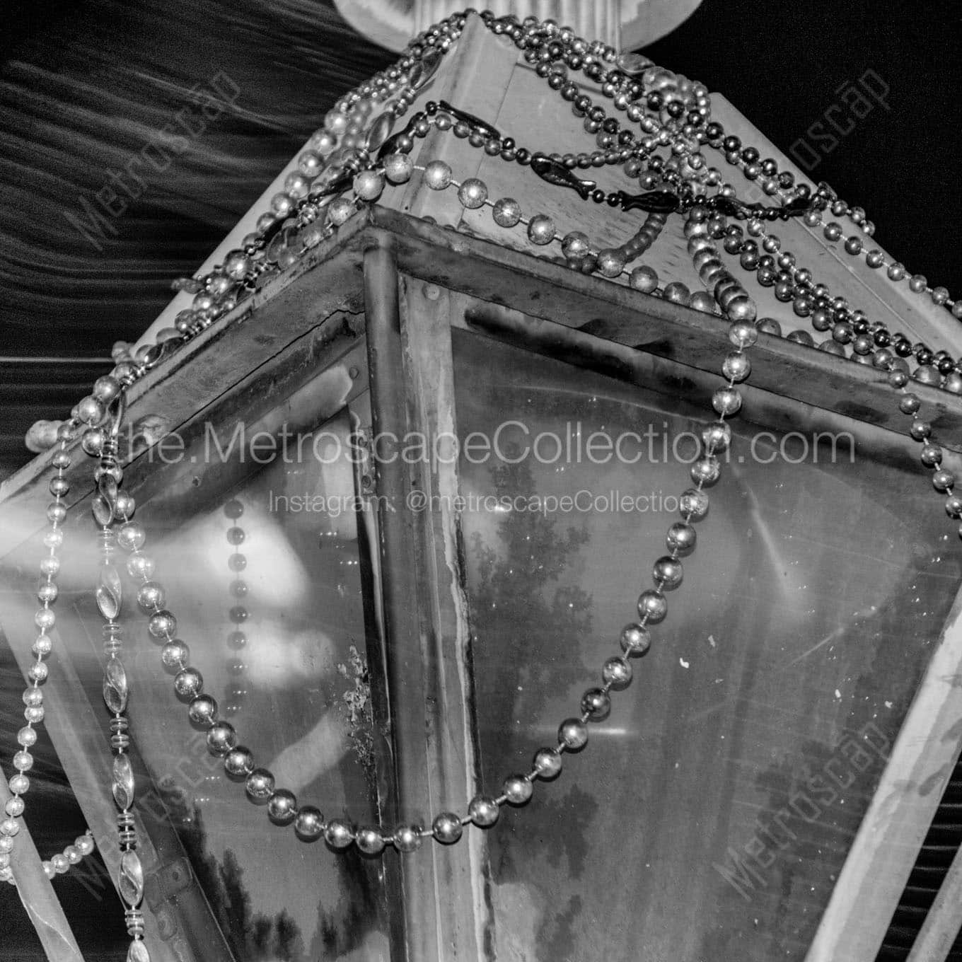 beads on lamp post french quarter nola Black & White Wall Art