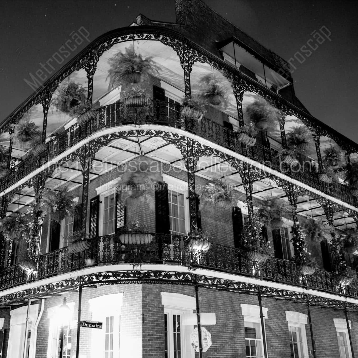 dumaine street at night Black & White Wall Art