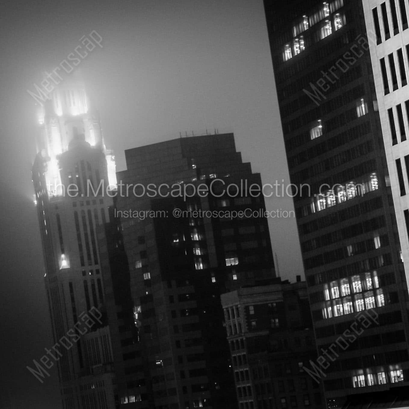 fog engulfs top leveque tower Black & White Wall Art