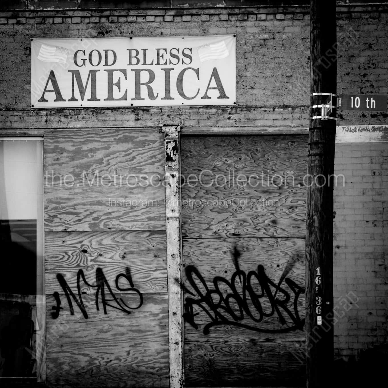 god bless america on dilapidated building Black & White Wall Art