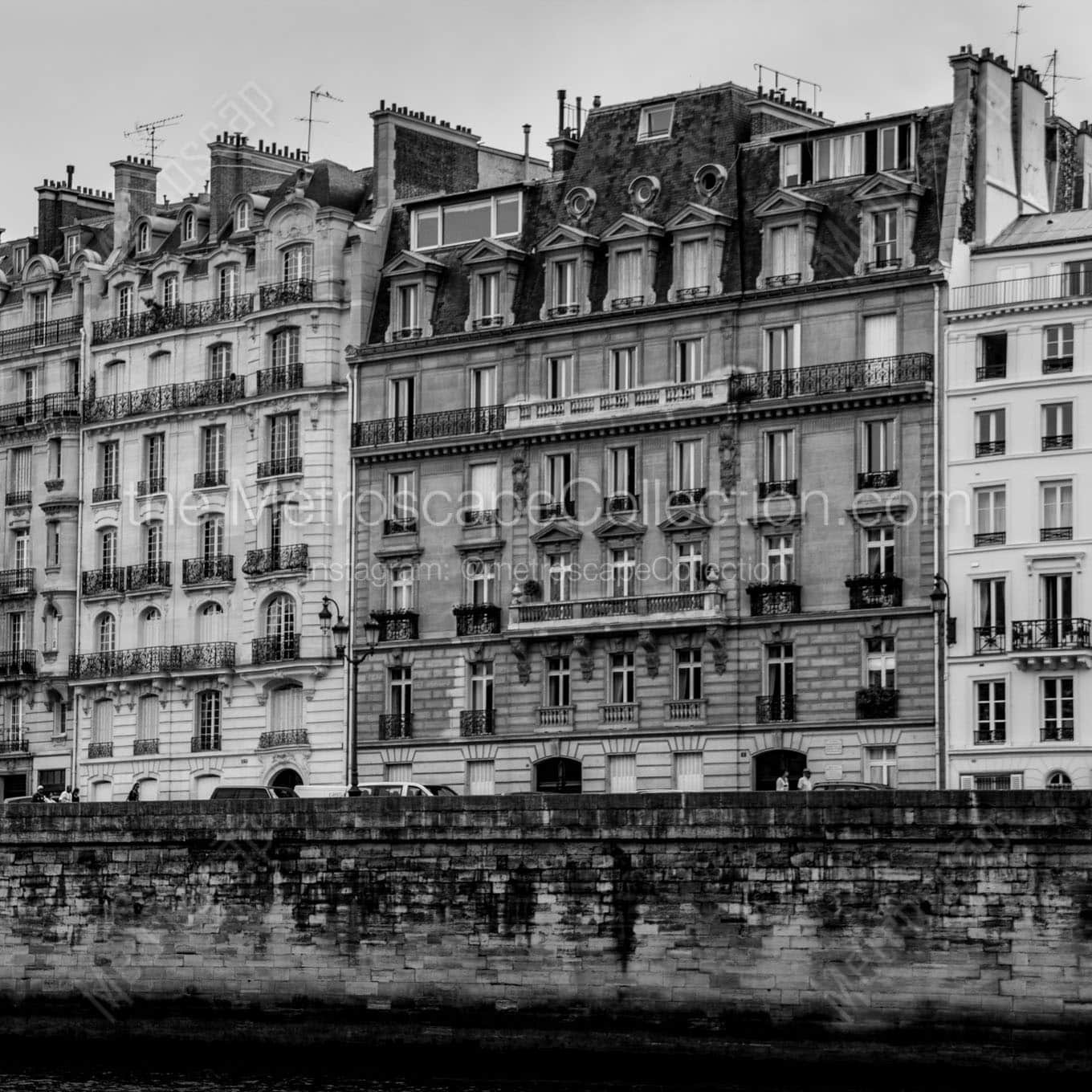parisian apartments along quai aux fleurs Black & White Wall Art