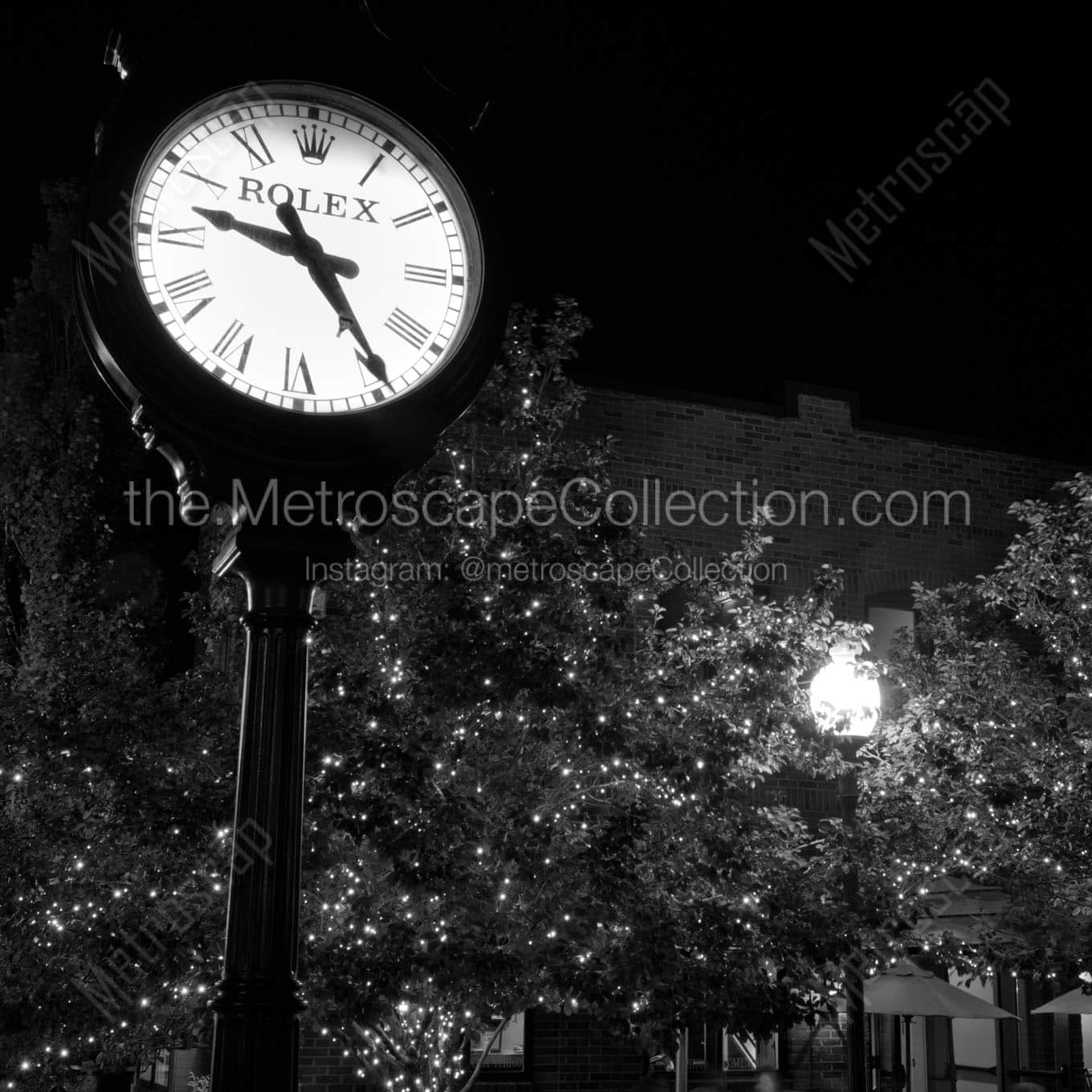 rolex clock on main street Black & White Wall Art