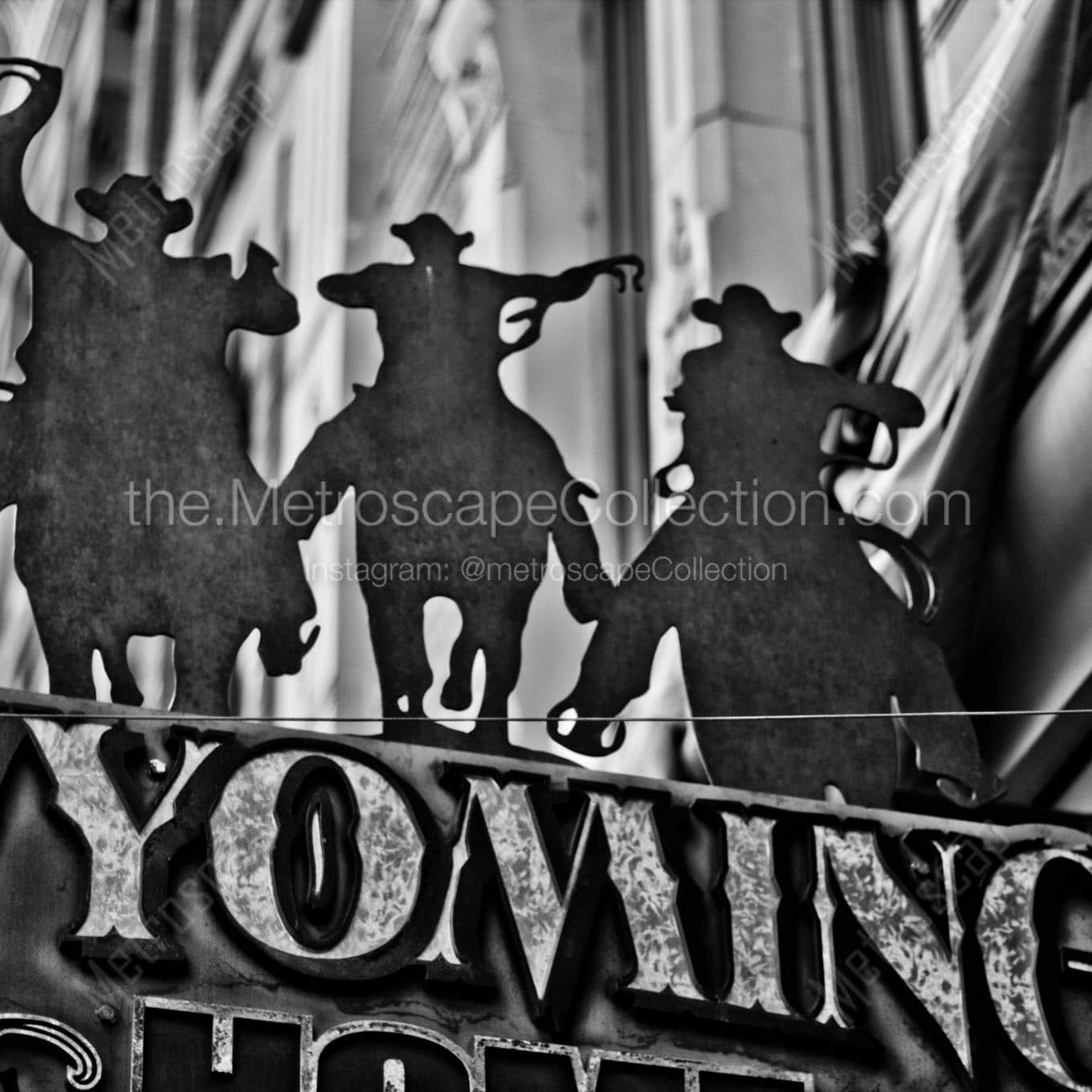 silhouette cowboys on horses Black & White Wall Art
