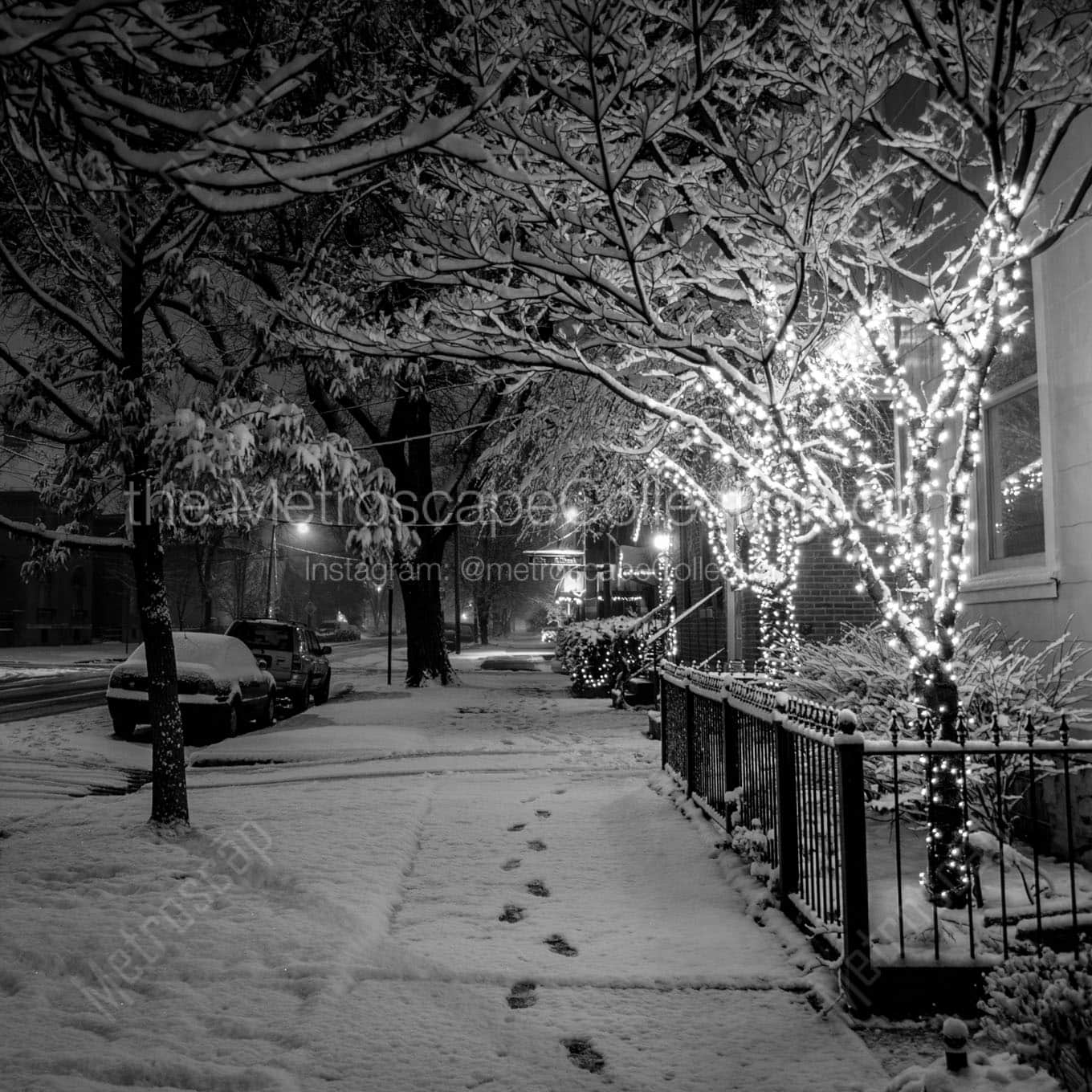 snowy german village brick sidewalk Black & White Wall Art