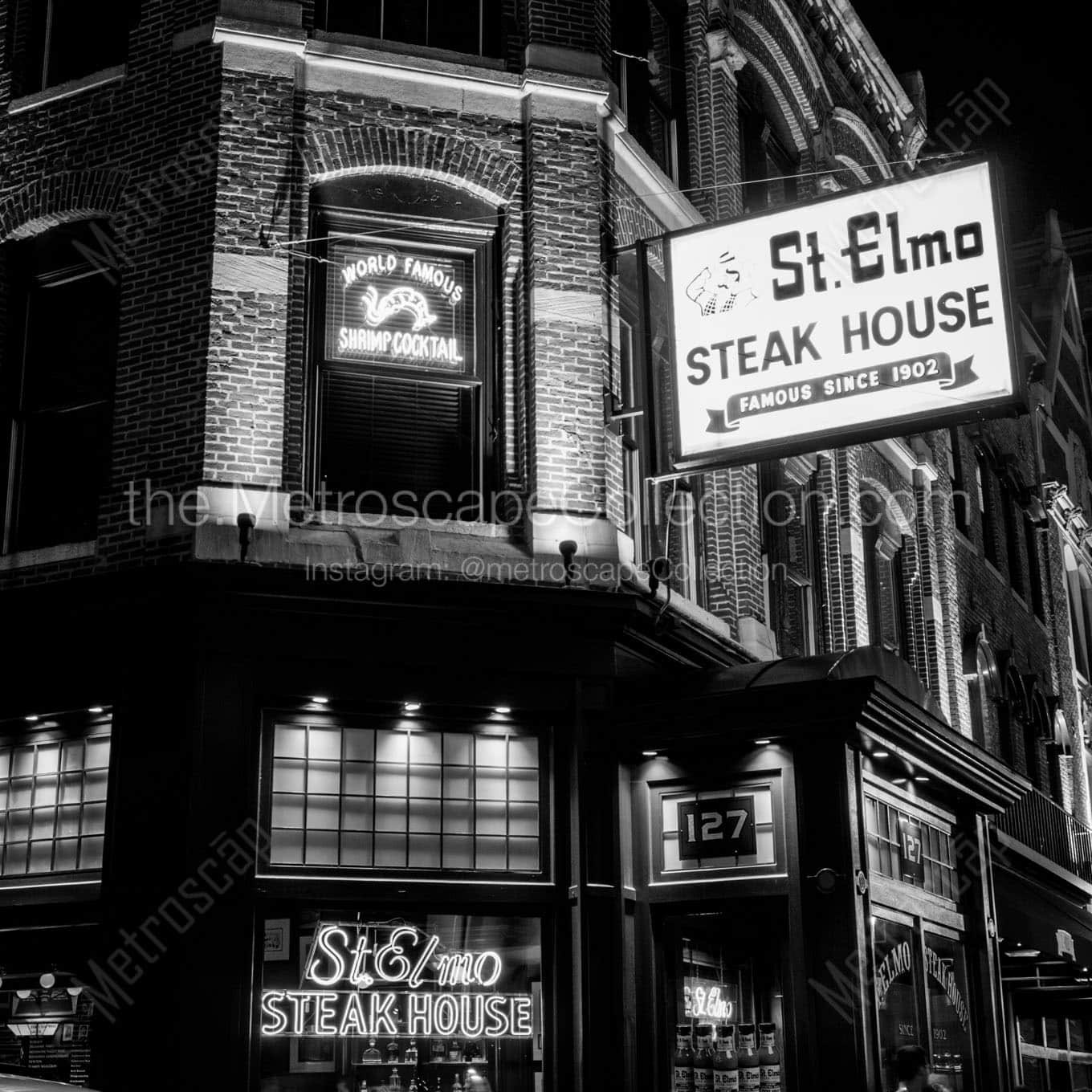 st elmo steak house at night Black & White Wall Art