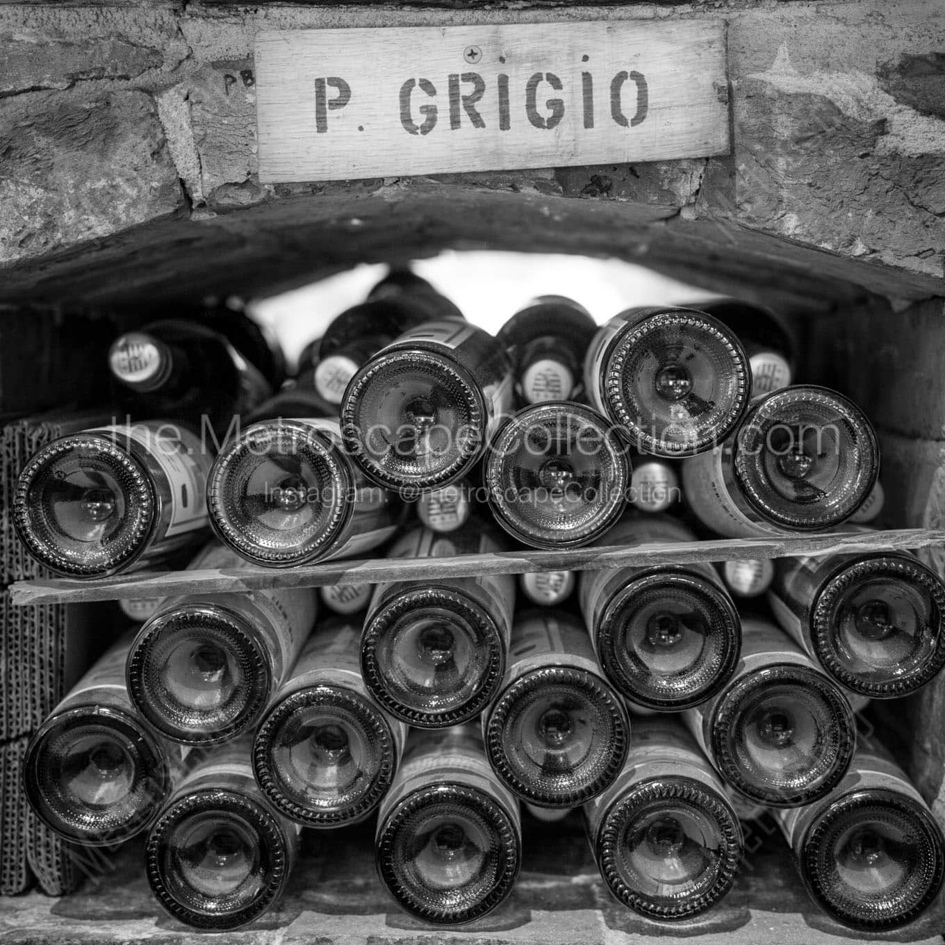 stacked pino grigio wine bottles Black & White Wall Art