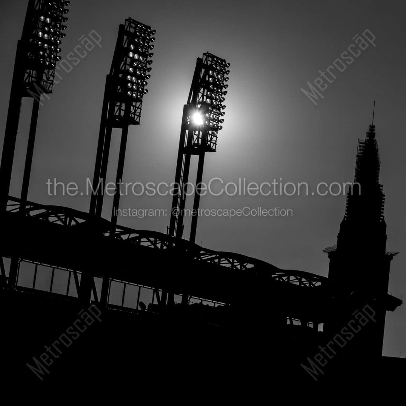 sunset through jacobs field lights Black & White Wall Art