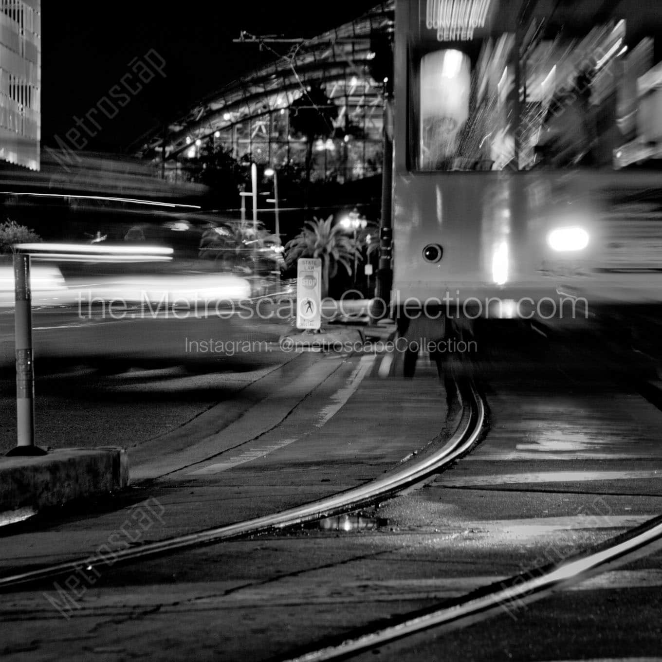 taxi and street car channelside Black & White Wall Art
