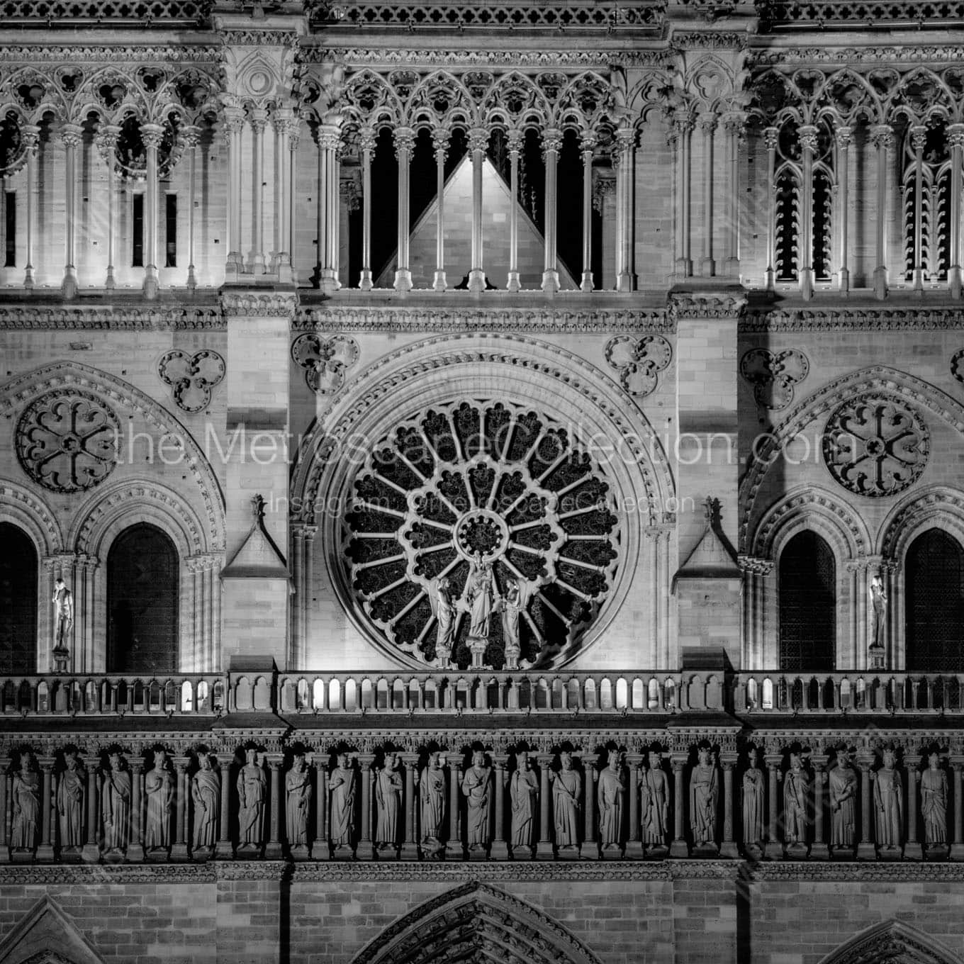 western facad of notre dame de paris at night Black & White Wall Art